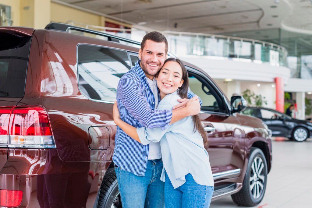 couple-car-dealership